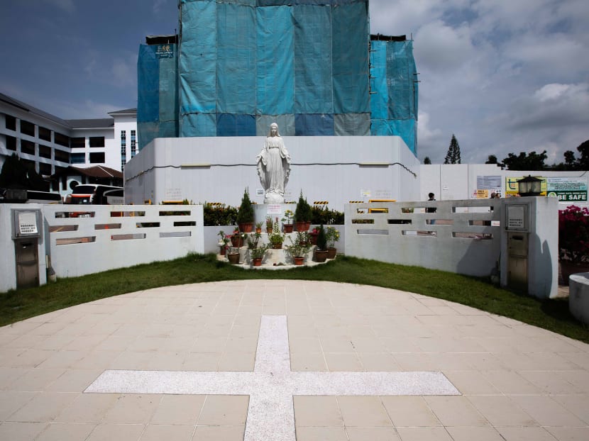 Race Koh Jun Xian, 37, purportedly climbed over a fence, entered the compound of the Church of the Nativity of the Blessed Virgin Mary (pictured), and pasted two yellow marbles on the statue’s eyes using Blu-Tack. Race Koh Jun Xian, 37, purportedly climbed over a fence, entered the compound of the Church of the Nativity of the Blessed Virgin Mary (pictured), and pasted two yellow marbles on the statue’s eyes using Blu-Tack.