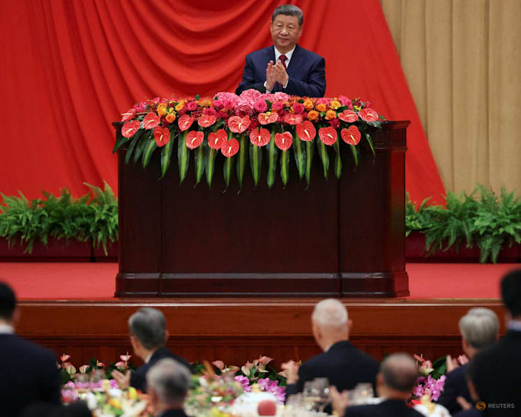 Marking China's national day, Xi calls for progress towards reunification with Taiwan