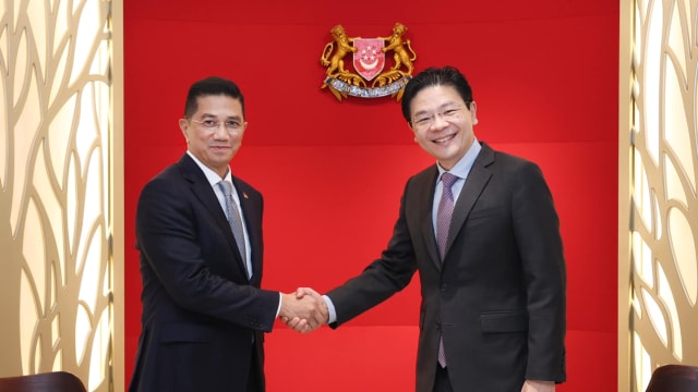 黄循财同到访我国的阿兹敏会面 进行了富有成果的交流