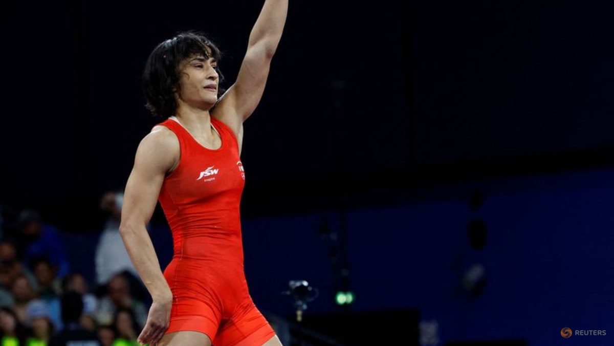 Wrestling-India's Phogat ends retirement for another crack at Olympic glory