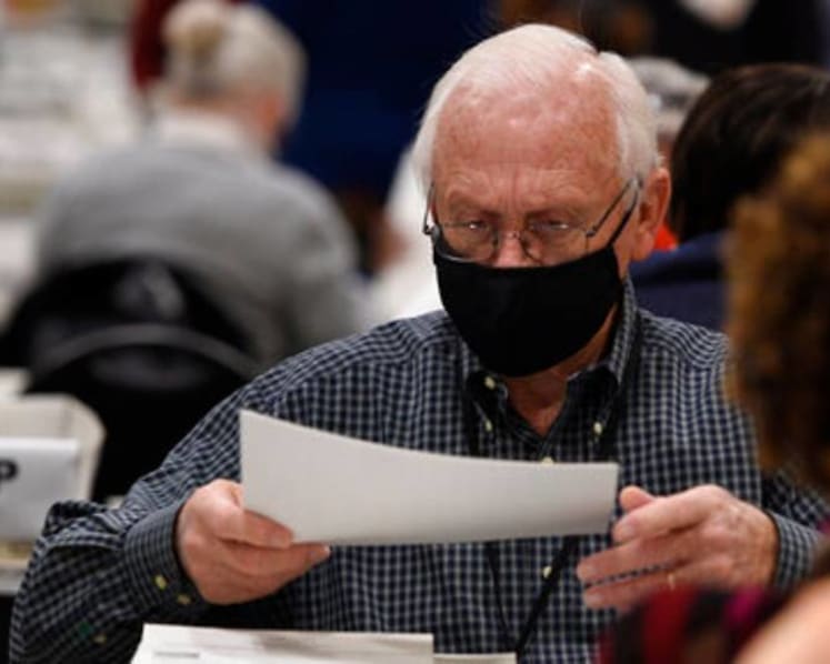 Hand tally of presidential race finds new ballots in Georgia: Officials
