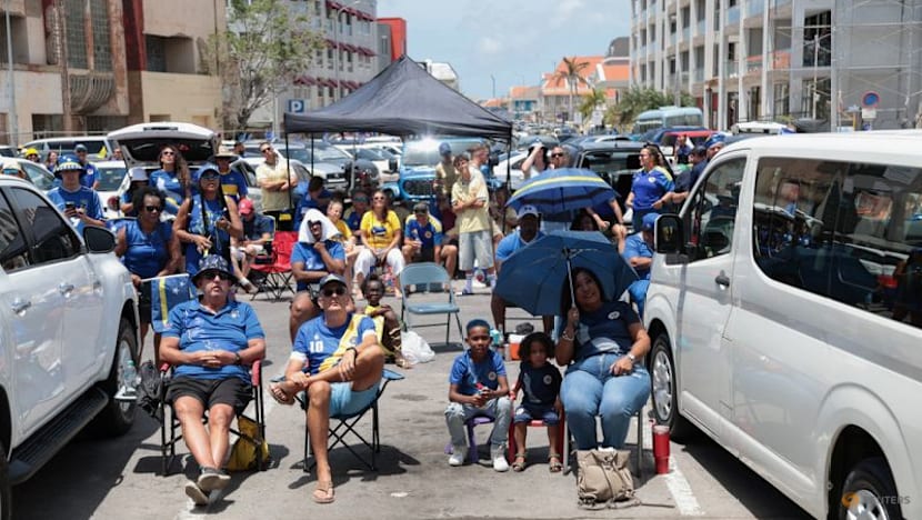 Curacao fans take heavy defeat in their stride as World Cup delight undimmed