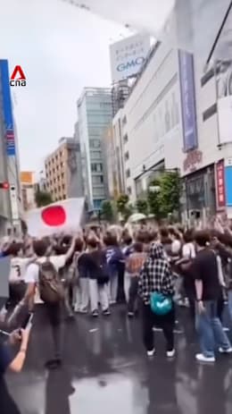 Fans in Japan celebrate 2-2 draw with Netherlands at Shibuya crossing