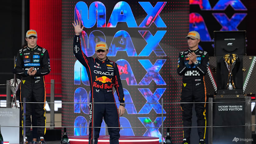 Tearful Norris takes F1 title as Verstappen wins Abu Dhabi race