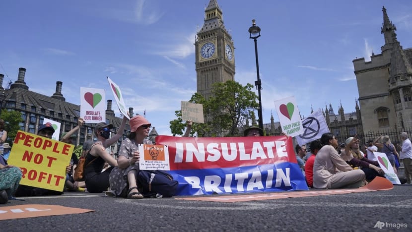 Protesters in UK decry climate change after record heatwave Protesters in UK decry climate change after record heatwave