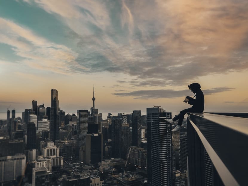 The death of famous "rooftopper" Wu Yongning shed light on the thrill-seeking subculture associated with rooftopping, in which ambitious daredevils scale skyscrapers around the world and take selfies against magnificent views above the tops of cities, from New York to Dubai to Russia. Photo: Yeshi Kangrang on Unsplash