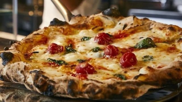 从Justin Bieber到Jeff Bezos都爱，日本人气Pizza Studio Tamaki狮城开店了！