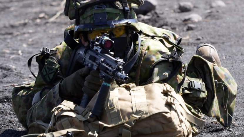 Japan OKs bigger budget to host US forces, step up alliance 