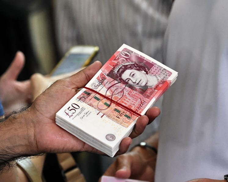 Weakened pound good news for holidaymakers, but many taking wait-and-see approach, say money changers