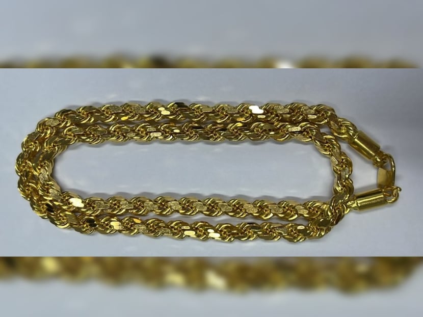 A photo of the gold necklace that was allegedly stolen.