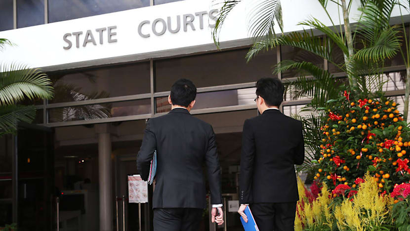 Two charged with cheating banks of S$1.7m through fraudulent business loans, bribing bank officers