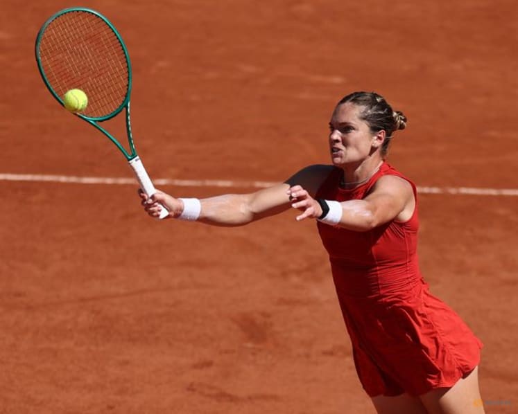 Bencic powers past McNally into third round of French Open