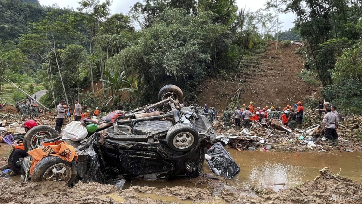 Indonesia landslide death toll rises to 22 as search paused