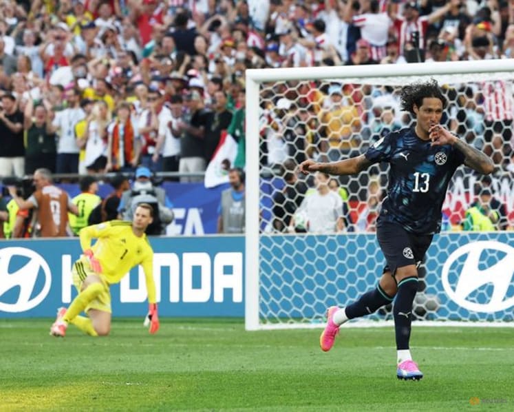 Paraguay stun Germany on penalties to reach World Cup last 16