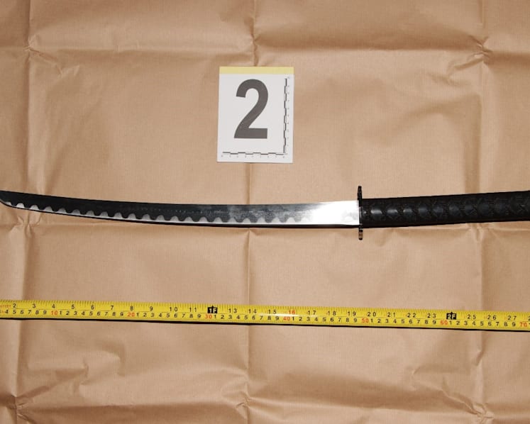 Man charged after he allegedly chased another man while holding katana sword