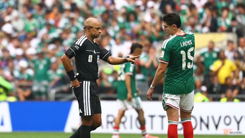 Mexico get World Cup party started with 2-0 win over nine-man South Africa