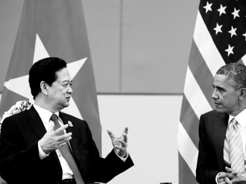 Mr Obama meeting Vietnamese Prime Minister Nguyen Tan Dung in Naypyidaw yesterday. With the US outmanoeuvred by China during the APEC meeting, the economic power game entered a second stage in Myanmar this week, where ASEAN hosted the East Asia Summit. Photo: REUTERS