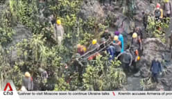 Bodies of 2 Singaporeans undergoing forensic examination after being retrieved from Mount Dukono 