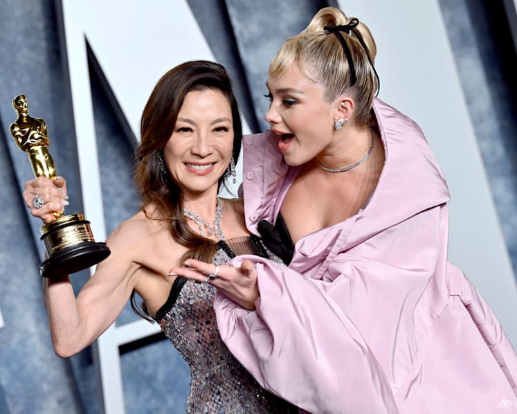 Michelle Yeoh and Brendan Fraser feel the love at Vanity Fair post-Oscars party