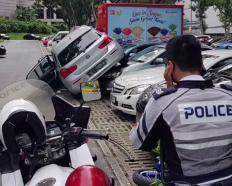 Car mounts two vehicles at Orchard Road car park, SCDF called in to extricate elderly person