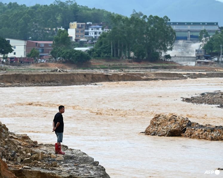Rescuers search for survivors of China storms as super typhoon nears