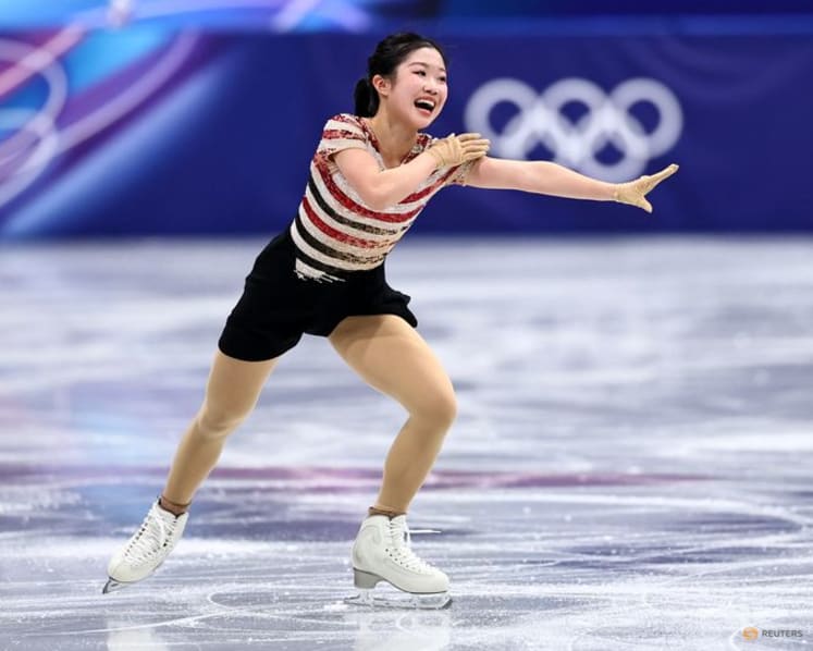 Figure skating-Japanese teenager Nakai surges into lead in Milan