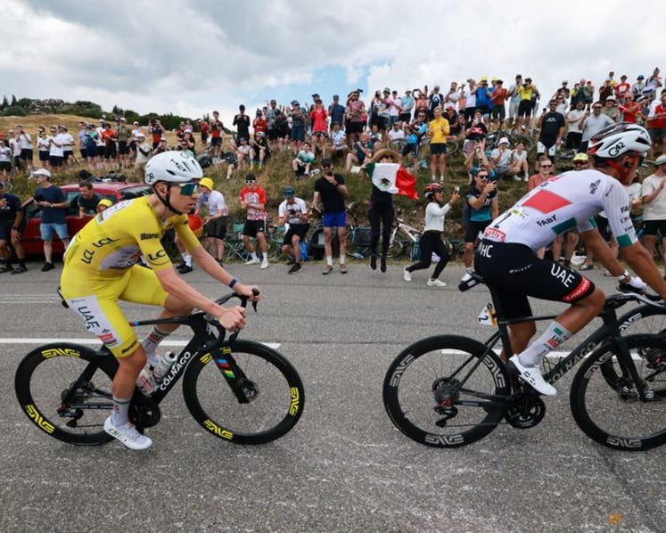 Pogacar rides to solo win on Tour de France stage 14 to increase overall lead
