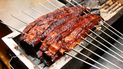 These Live Eels Are Split And Roasted Right Before Your Eyes