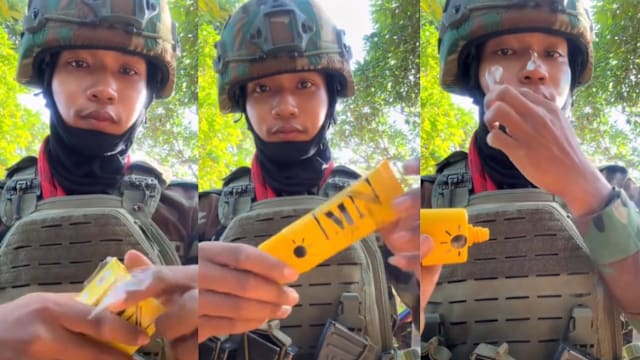 柬兵枪林弹雨下  直播卖防晒霜