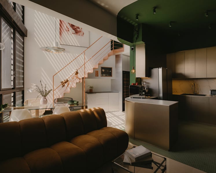 Colour blocking and artworks bring personality to this Singapore home