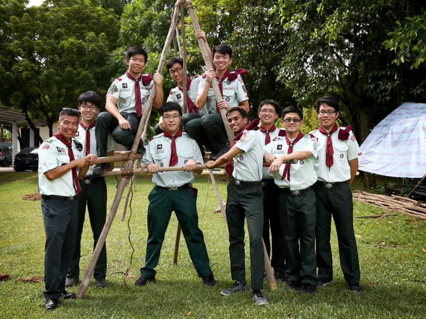 The group of scouts from Raffles Institution's Year 6 batch head down to Crest Secondary once a week to conduct activities such as teaching the younger scouts to tie knots, build catapults, and read maps.