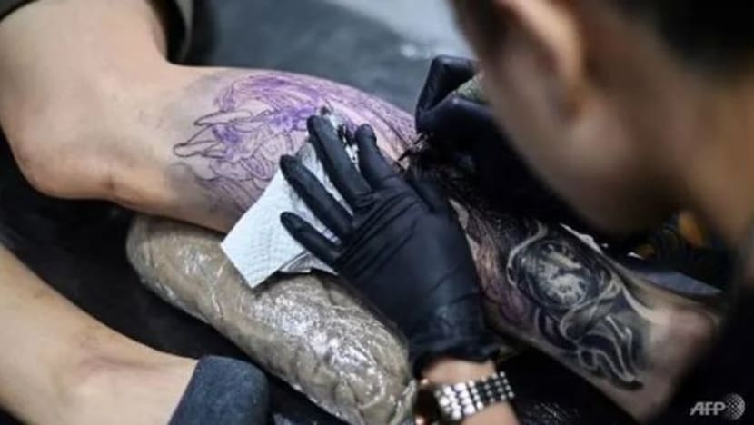 M'sia arah siasat pertunjukan tatu separuh bogel