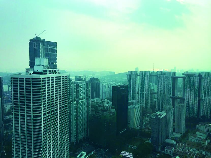 View from the Capital Tower yesterday. Singapore’s air quality crept into the ‘moderate’ range for the first time since August. Photo: Chan Zhe Ying