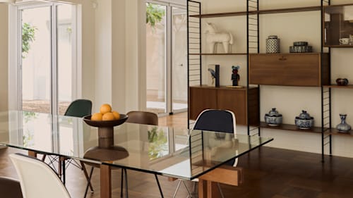 A restored home in Thailand with mid-century modern furniture and timeless interiors