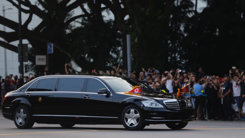 ‘Once in a lifetime’: Hundreds gather outside hotels, Istana to catch sight of Trump and Kim