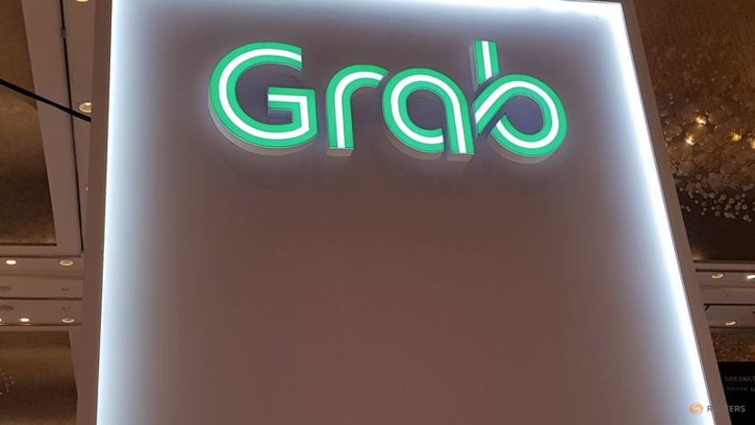 Grab raises annual revenue forecast, shares jump Grab raises annual revenue forecast, shares jump