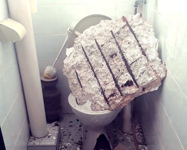 Ceiling concrete slab falls in toilet of old Toa Payoh flat, narrowly misses domestic worker