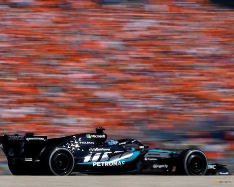 Russell ends long wait with 'cold-blooded' win