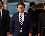 Japan trade minister holds brief talks with Chinese counterpart amid diplomatic row