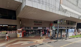 Mall takes owner of service road leading to its loading bay to court over access for rubbish trucks