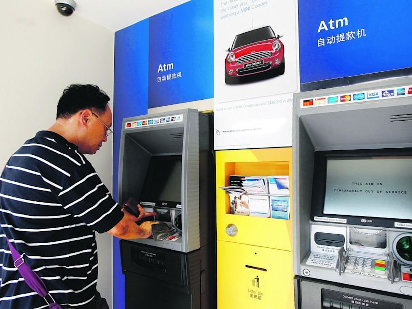 Video teller machines, helpers at POSB branch offer services to seniors