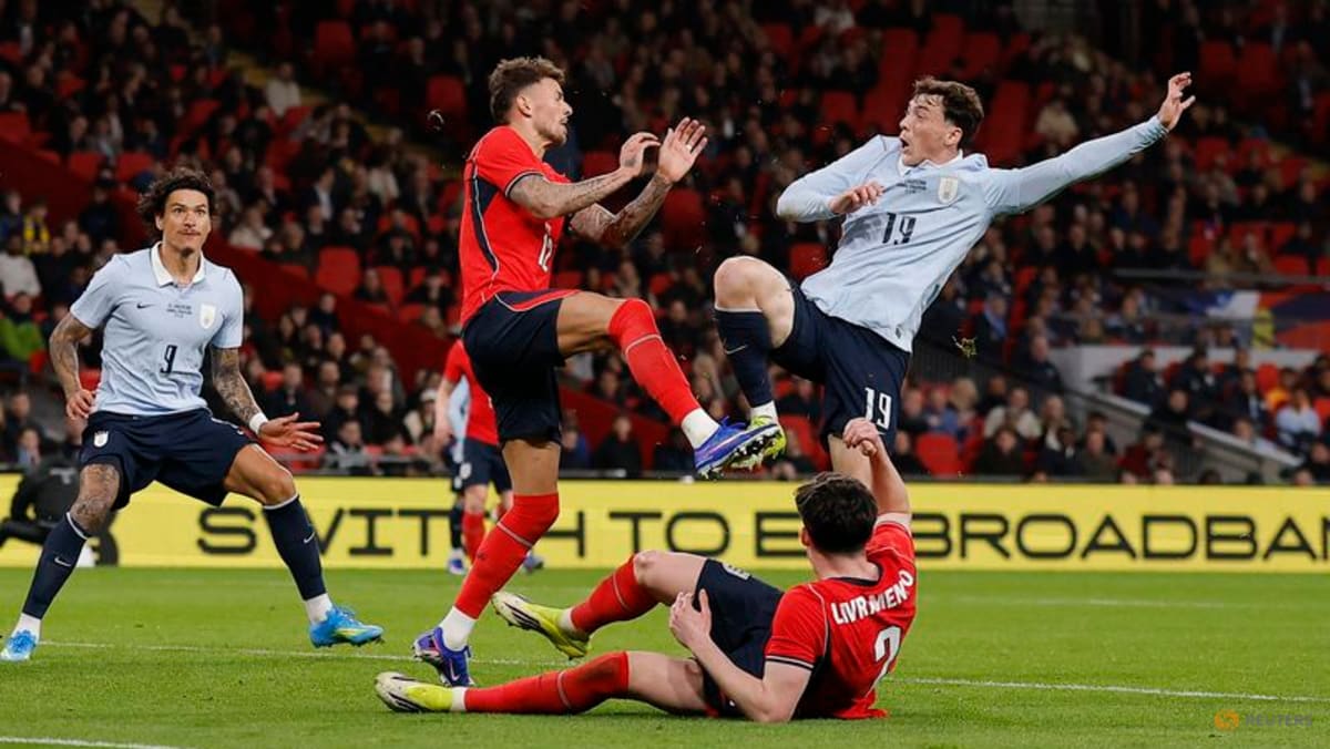 Uruguay grab late draw with England after White booed