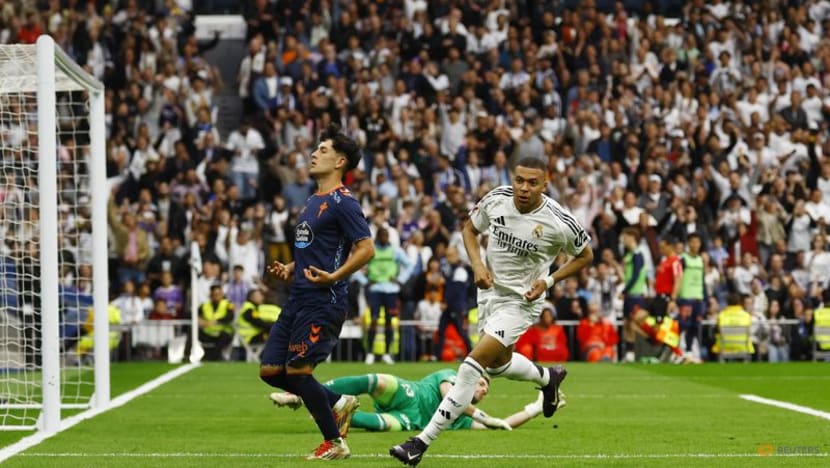 Mbappe double helps Real win 3-2 over Celta Vigo to keep pressure on Barca