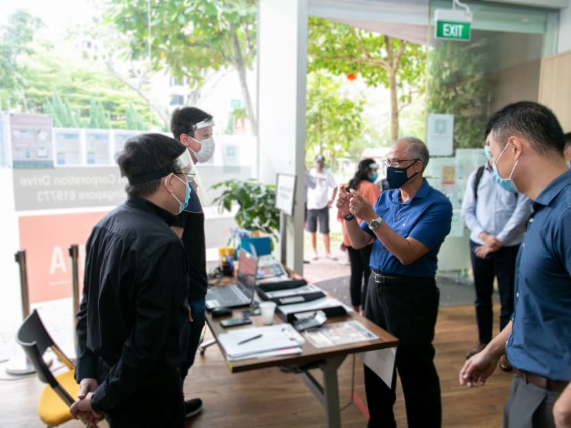 Mr Masagos Zulkifli (second from right), Minister of Social and Family Development, visiting a Social Service Office where officers are administering the Covid-19 Support Grant. Mr Masagos Zulkifli (second from right), Minister of Social and Family Development, visiting a Social Service Office where officers are administering the Covid-19 Support Grant.