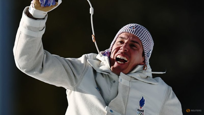 Biathlon-Fillon Maillet storms to gold for France in 'perfect race'