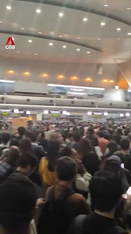 Tens of thousands stranded at Malaysia immigration checkpoints after 5-hour system crash