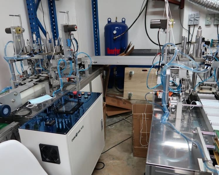 HSA finds illegal mask-making, repackaging facility in Ubi; more than 80,000 masks seized