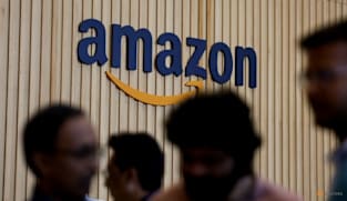 Amazon surges as US stocks shrug off bond yield worries