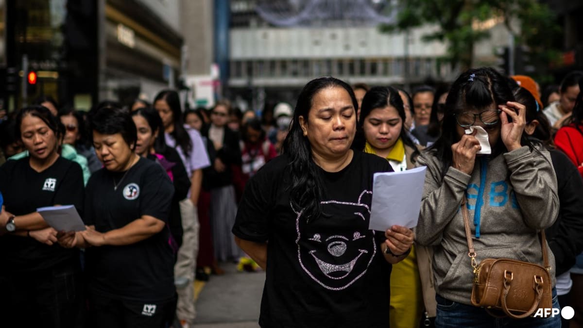 Migrant domestic workers seek support, solace after Hong Kong fire