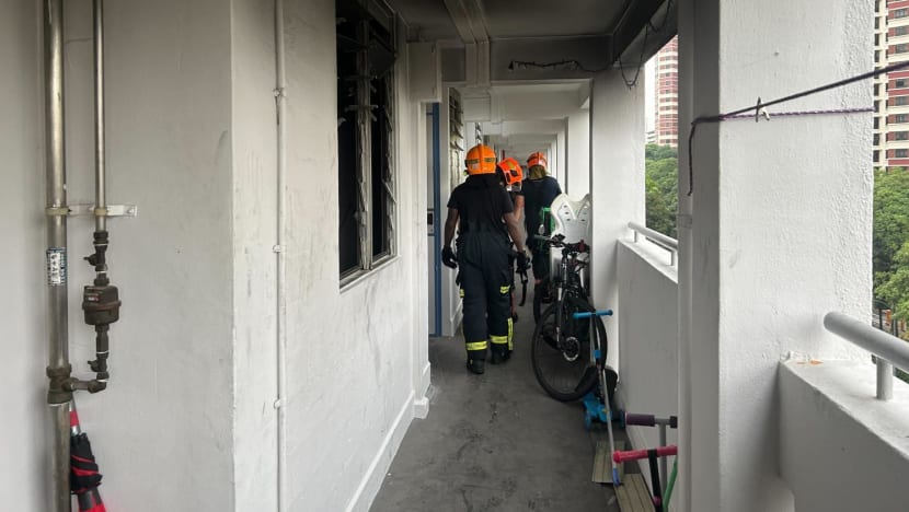 Witness says 3 children rescued from Redhill flat fire covered in soot, 'looked scared' but able to walk